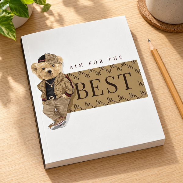 Aim for the Best — Teddy Composition Notebook — lifestyle mockup